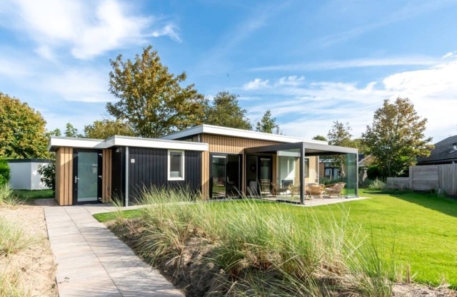 This chalet is the icing on the cake. Take a quick look inside! With a see-through fireplace, cookin