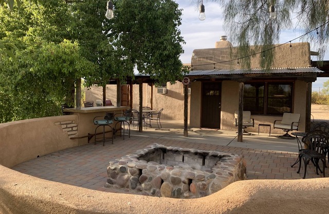 This secluded ranch house on a spacious 5-acre lot offers a perfect retreat