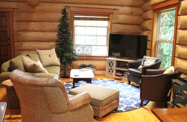 Three story log cabin w/ game room, new hot tub, BBQ, and all the extras