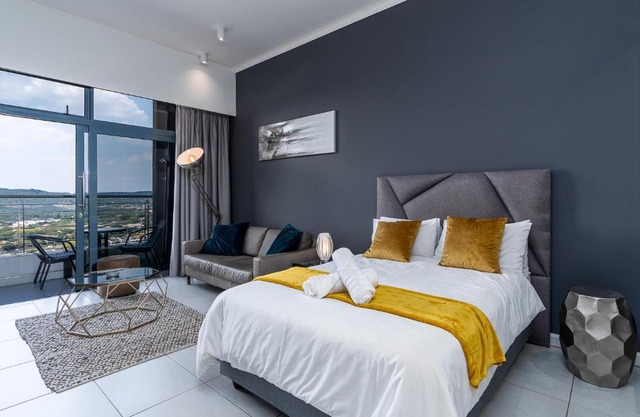 Top Floor Menlyn Maine studio apartment with Stunning Views & No Load Shedding