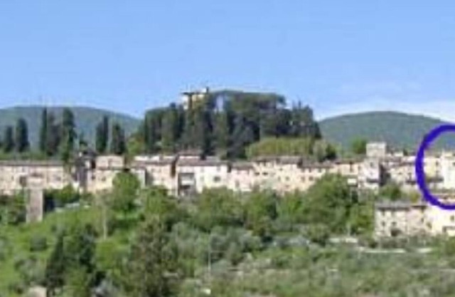 Townhouse in ancient tower in medieval Cetona