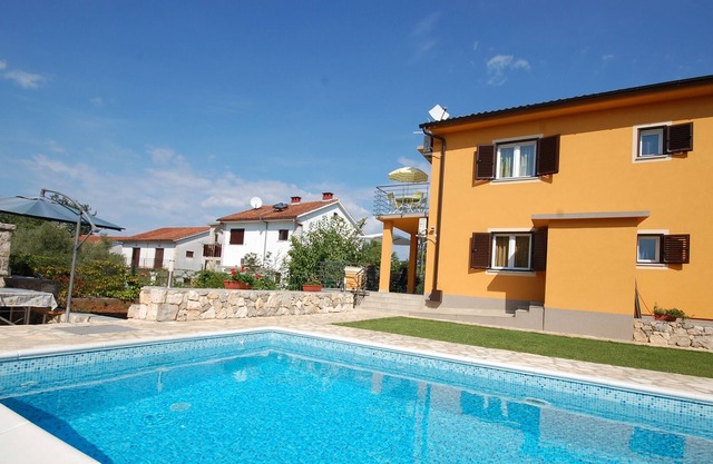 Two bedroom apartment with shared pool and gym