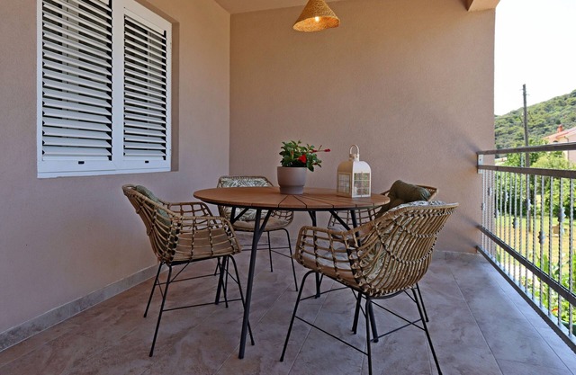 Two bedroom apartment with terrace Kampor, Rab (A-17396-a)