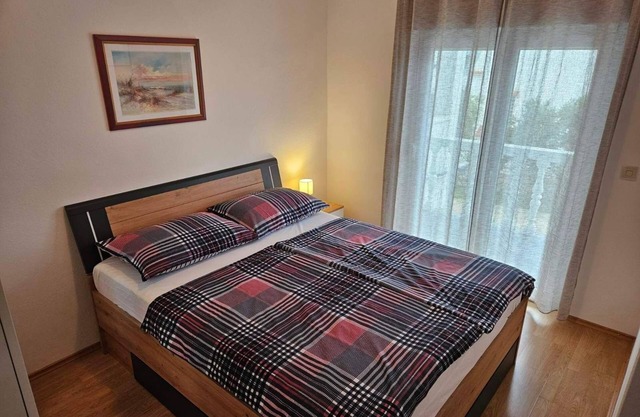 Two bedroom apartment with balcony and sea view Barbat, Rab (A-4951-c)