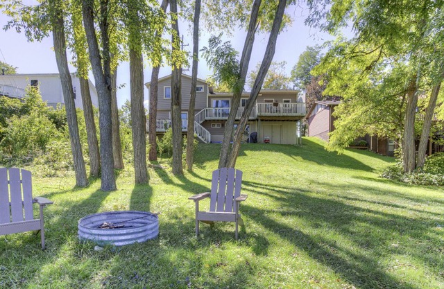 Unique river front home in the village. Walk to downtown.
