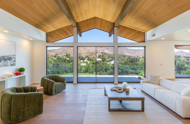 Unobstructed 270 degree golf course views, a completely remodeled home