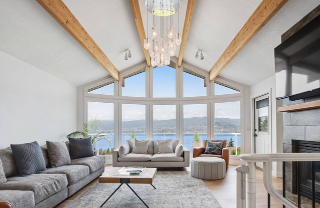 Upscale home with gorgeous lake views, private hot tub, fireplace & firepit