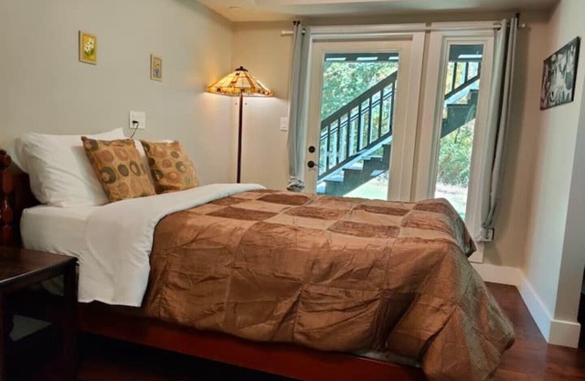 Urban Oasis with stream Private Home on 1.3 Acres