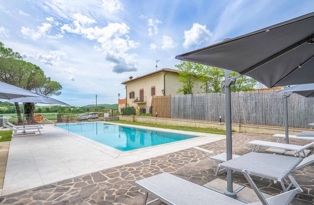 Vacation home with pool and beautiful views over the Tuscan countryside.