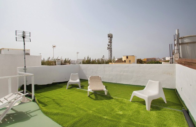 Vacation Home 'Atico Vecindario, Aeropuerto' with Private Terrace, Balcony and Wi-Fi