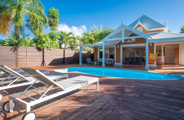 Villa La Palmeraie located in a secure residence 5-minute walk from beaches.