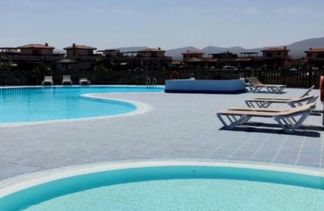 'Villa Oasis Carol 6' with Mountain View, Shared Pool & Wi-Fi