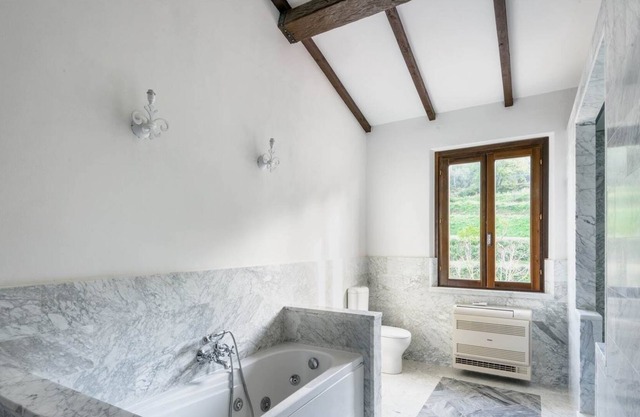 Villa surrounded by greenery on the Maremma hills a few km from the sea