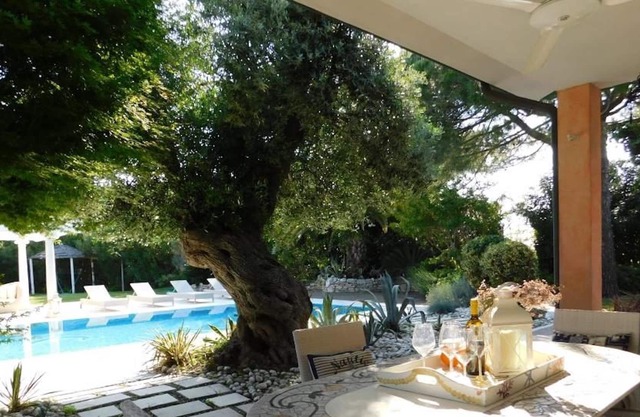 Villa with swimming pool and lagoon view in Albarella Island by Beahost Rentals