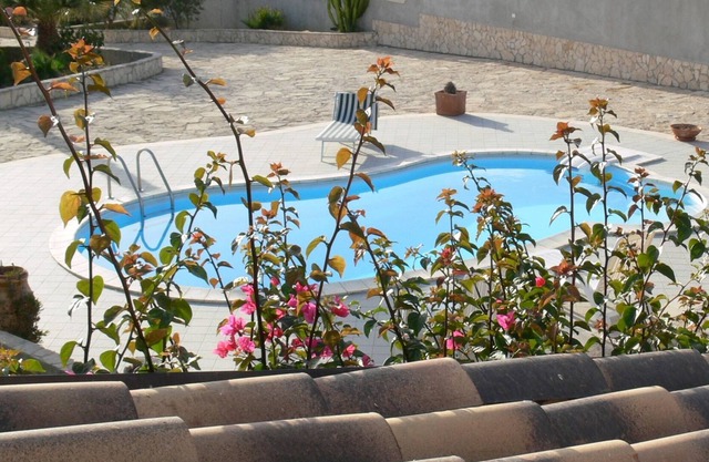 VILLA WITH POOL AND GARDEN, in the City of the Valley of the Temples.