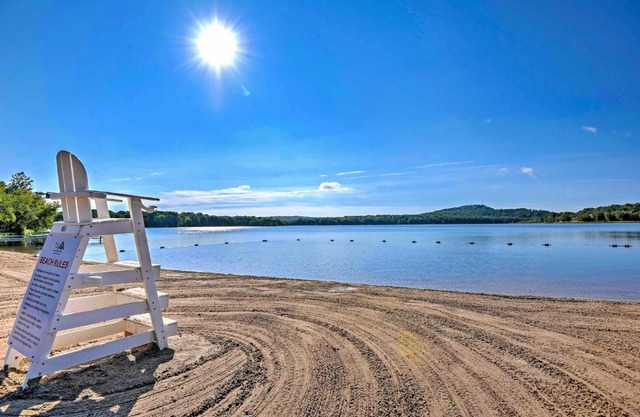 Walk to Beaches Tree-Lined Pocono Lake Retreat!