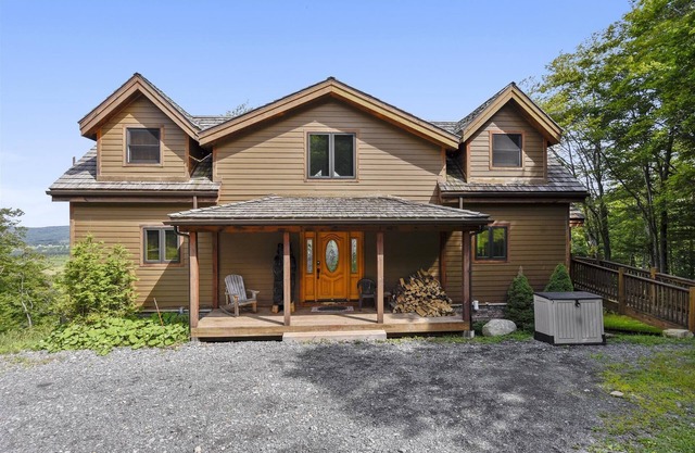 Walk to the slopes from this beautiful mountain home! Views, Views, Views!