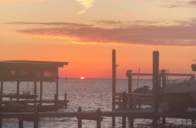 Watch sunsets and fish from your own private home and dock on Tampa Bay,