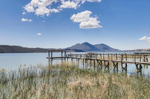 Watefront Getaway with Mtn Views and Dock in Clearlake