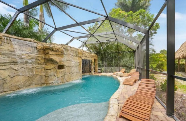 Waterfall Pool! Tiki Hut! Amazing Retreat Property