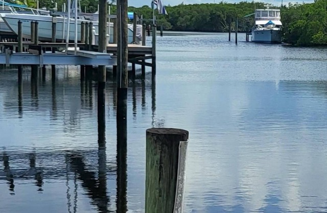 Waterfront heated pool home,dock,close beaches,world class sail fishing & golf!!