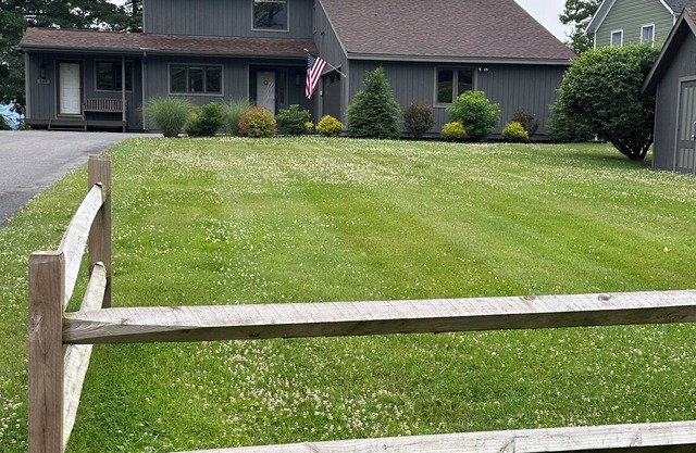 Waterfront home with private dock and sundeck that enjoys spectacular sunsets.