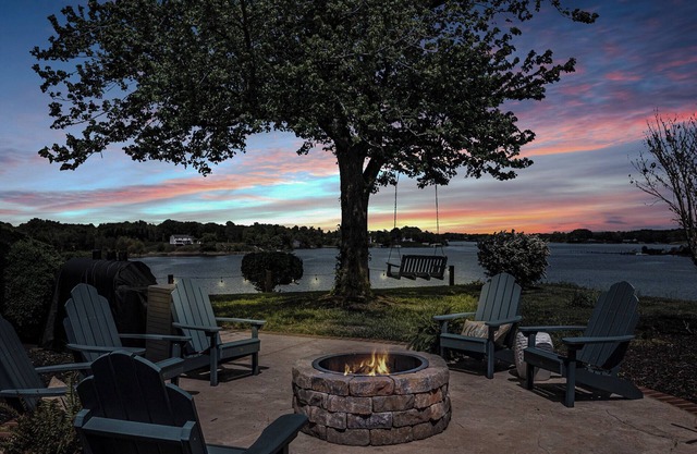 Waterfront retreat with dock, kayaks, and outdoor living. Bring the boat!