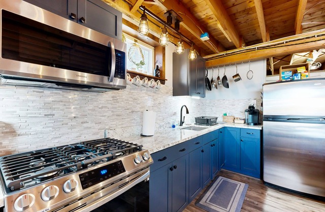 Waterside retreat with streaming, grill, open layout, full kitchen, & W/D