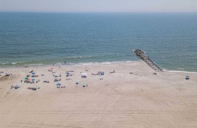 We're Dune It Well and invite you to come live literally on the beach!