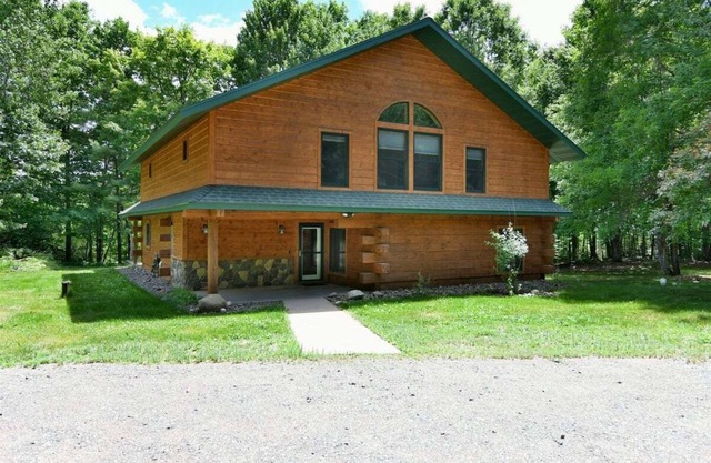 Whispering Waters Lodge with Waterfall, Pond and Trails on Property in Delta, WI