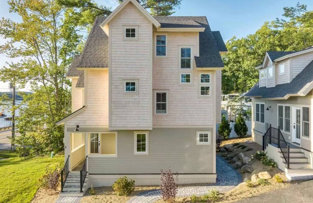 Winnipesaukee Lakefront with Boat Dock Home in Paugus Bay