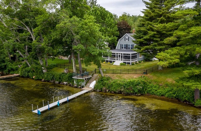 Winnipesaukee waterfront escape with private dock and guest cottage