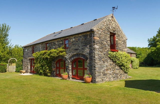 Wisteria Cottage is set in the north of the Isle of Man in an expanse of farmland providing the perf