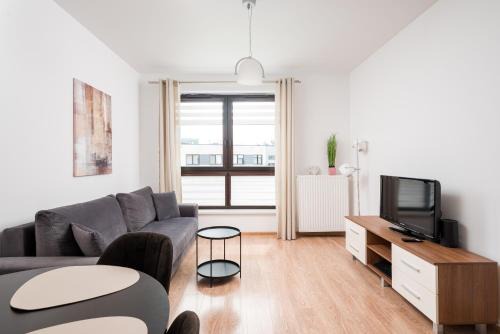 Wola Parkside Comfy Studio by BookingHost