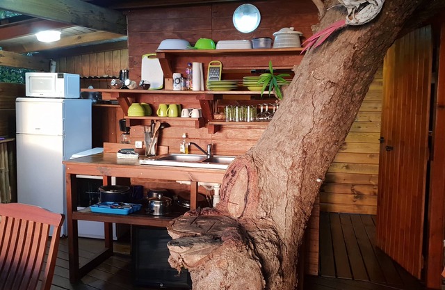 Wooden house in a mango tree with exceptional view of the caribbean