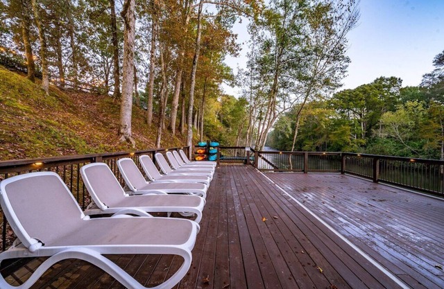 Worth the Wait ~ Riverfront cabin with hot tub, game room, play set and views!