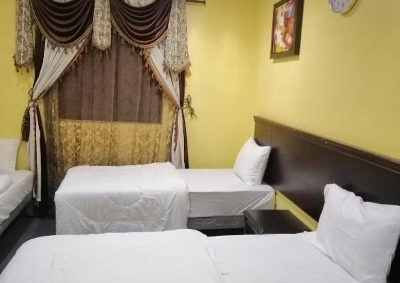 Mecca Apartment | فندق دار الزهور للشقق والغرف المفروشة