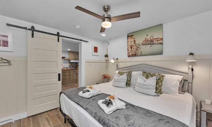Forest Hills House | 1 bedroom, 1 bathroom sleeps max 4 guests with the sleeping arrangements being a king bed and futon that sleeps 2