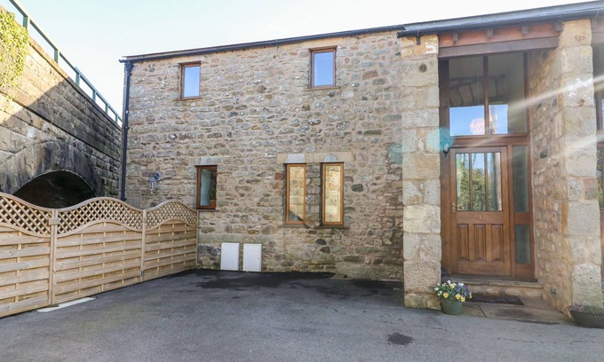 Carnforth Cottage | 1 NETHERBECK BARN, pet friendly, with a garden in Carnforth