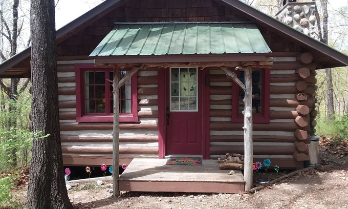 Eureka Springs Cabin | 100 year old log cabin. Spend your relaxing getaway with us