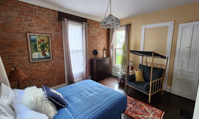 Elmira Apartment | 10ft ceiling, brick exposed apartment w/ artistic feel