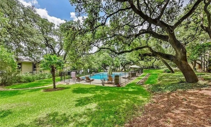 Allandale Condo | 12 minutes from downtown. Furnished. Pool. Laundry onsite. Great Landscaping!