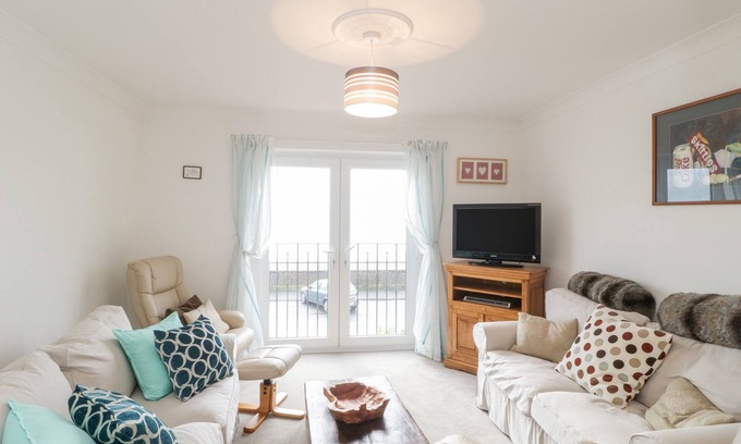 Seaton Cottage | 14 LYME MEWS, pet friendly, with a garden in Seaton, Devon