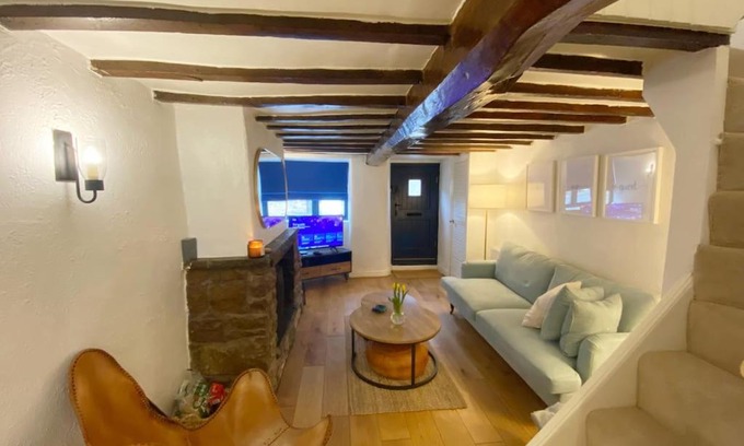 Upholland House | 1750's cottage with open fire and beams