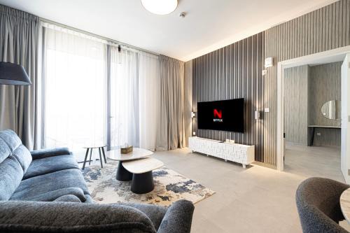 Sharjah Apartment | 1BR The Modern Al Jada Home by Blue Cloud Holidays