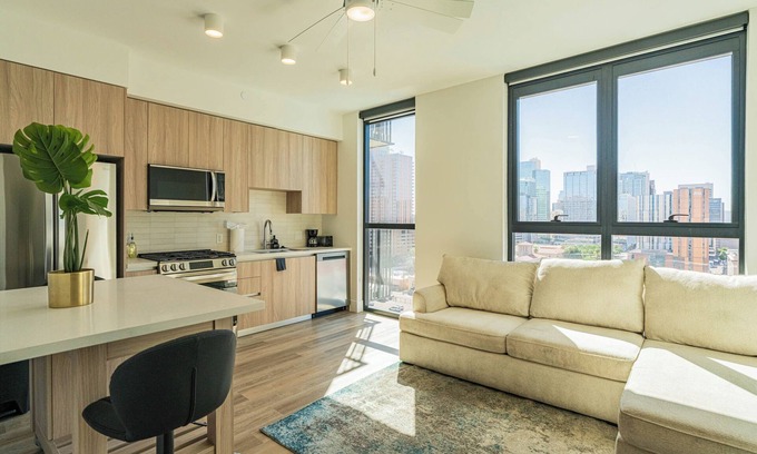 Evans Churchill Apartment | 1BR1BA Getaway with Pool, Gym & Rooftop Lounge