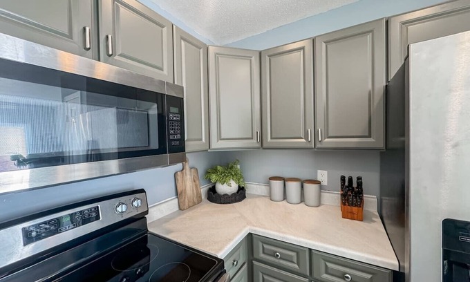 Sioux Falls Condo | 1st Floor Condo, Zero Threshold Door, Garage, Patio