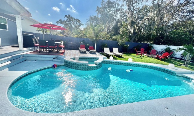 Clearwater House | 2 homes next to each other.Heated Pool, Spa & Backyard Games! SLEEPS 23 people!