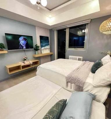 San Fernando Apartment | 20th floor Studio with 2 BEDS,Hi-Speed WIFI, NETFLIX,WIFI,YTpremium,Games,Washer,Kitchen,HIghFloor,BALCONY - RIENZI' HIRAYA AT AZURE NORTH