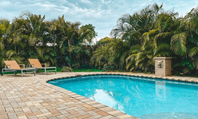 Royal Poinciana House | 3/2 Beautiful Pool home 2 miles from Hollywood Beach.